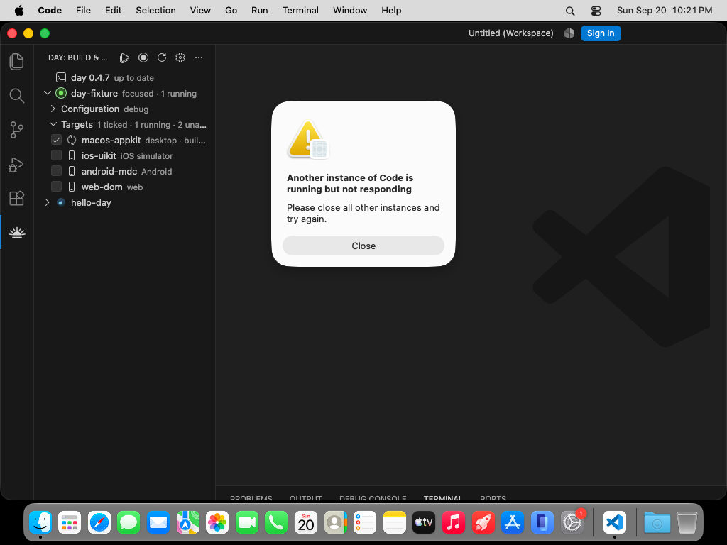 The Day app running beside the editor that launched it (macos-appkit) — macOS, AppKit
